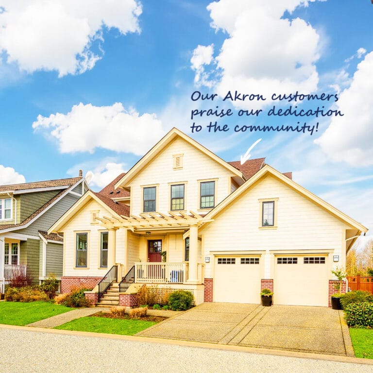 Trusted Akron Ohio home with a brand new roof on a sunny day.