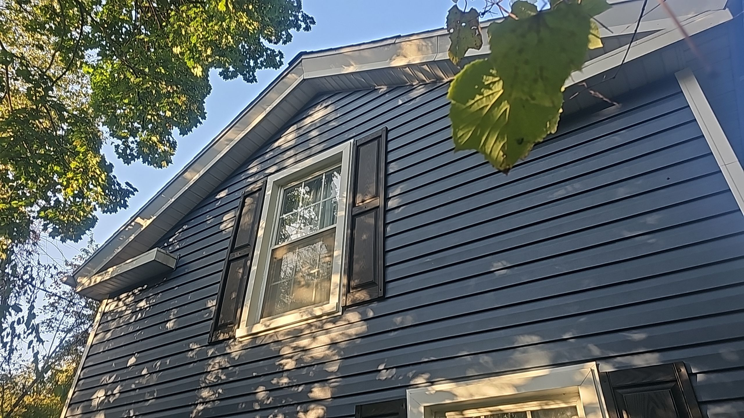 After siding service in Akron 44313 by Eagle Eye Roofing, home exterior finished